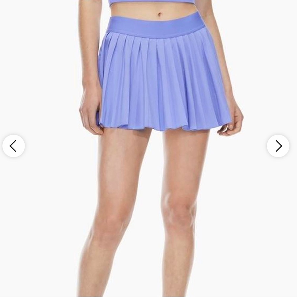 TnaMOVE™ Tennis Mini Skirt. Playful purple /size small